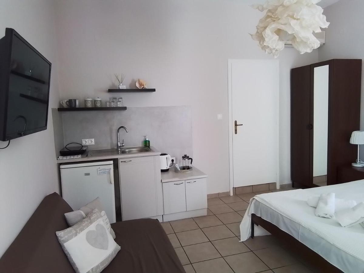 Morpheus Rooms Kini Exterior photo