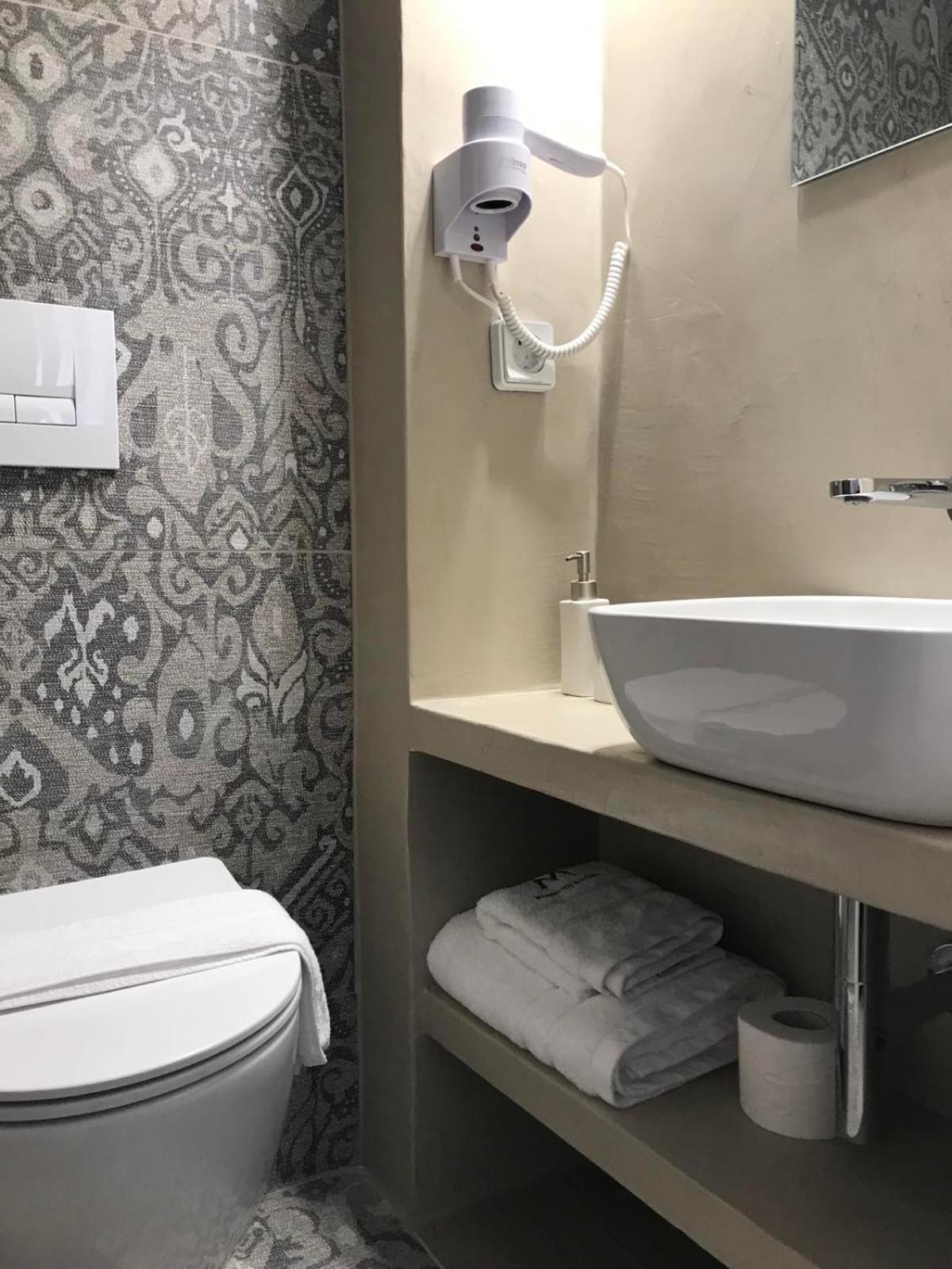 Morpheus Rooms Kini Exterior photo